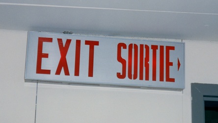 Bilingual exit sign