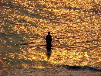 Man stands in the ocean