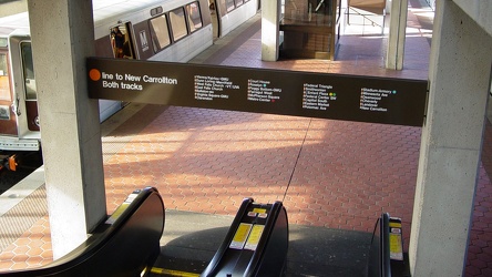 Signage above the platform escalators at Vienna