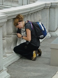 Woman photographing protest