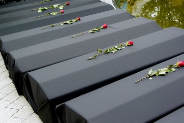 Roses on replica coffins