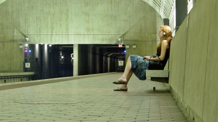 Woman waiting at Ballston-MU station