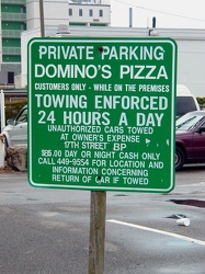 Parking sign at Domino's Pizza