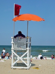 Lifeguard stand with surf warning flag out