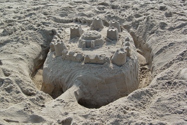 Sand castle with moat