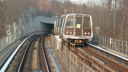 Green Line train entering tunnel portal