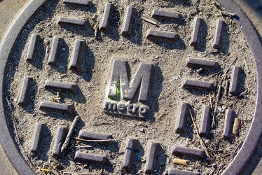 Metro manhole cover outside Forest Glen station