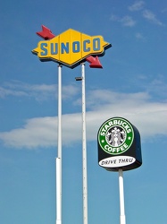 Sunoco and Starbucks signs