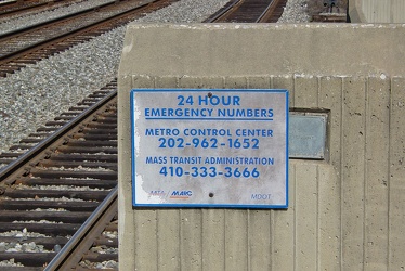 Emergency number sign at Greenbelt MARC station