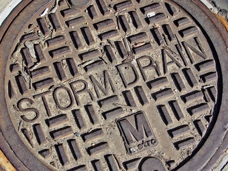 Storm drain cover at Greenbelt station