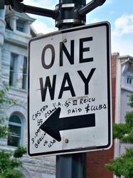 Graffiti on "ONE WAY" sign