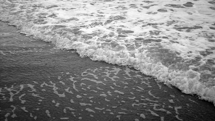 Wave moving up the beach