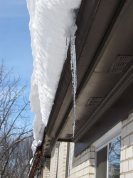 Snow on apartment building roof