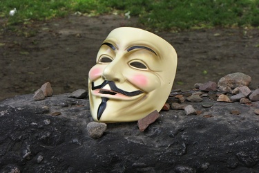 Guy Fawkes mask atop Samuel Adams grave