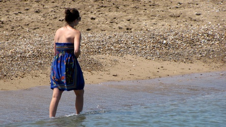 Woman walking along Lake Michigan