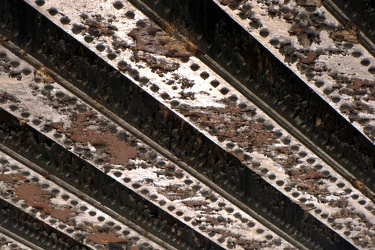 Rust on steel beams over Walnut Street