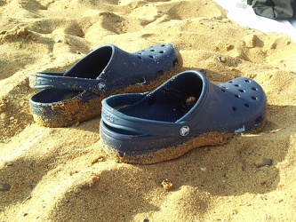 Crocs shoes on Sandy Point beach