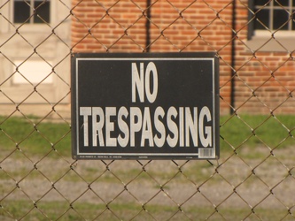 "NO TRESPASSING" sign