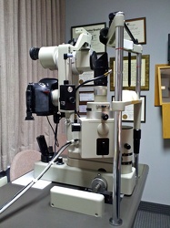 Slit lamp with camera attached