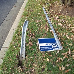 Fallen Ride On bus stop sign