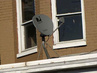 Satellite dish on roof of home