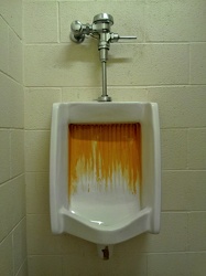 Rust-streaked urinal