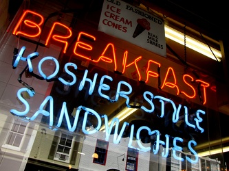 Neon sign in restaurant window