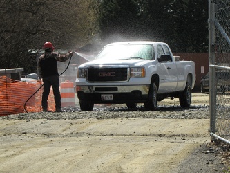 Truck being sprayed with water