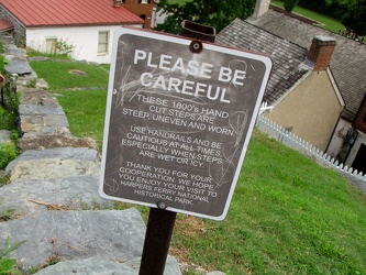 Warning sign for hand-carved steps