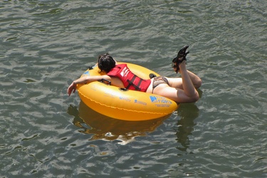 Woman laying on inner tube [02]