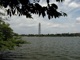 Washington Monument in scaffolding, viewed from across the Tidal Basin near the FDR Memorial