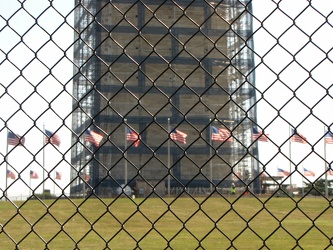 Base of the Washington Monument in scaffolding, viewed from the west