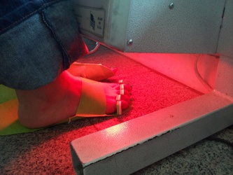 Nail polish drying under heat lamp