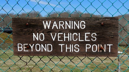 WARNING: NO VEHICLES BEYOND THIS POINT