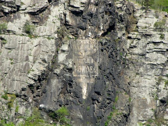 "Mennen's Borated Talcum Toilet Powder" sign