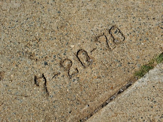 Date stamp on rest area pavement