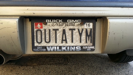 "OUTATYM" license plate