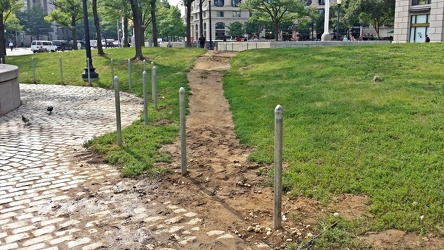 Desire path at Archives station