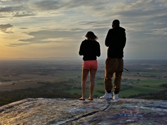 Couple looking at their cell phones at High Rock