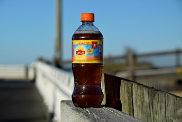 Bottle of Lipton tea on the boardwalk [02]