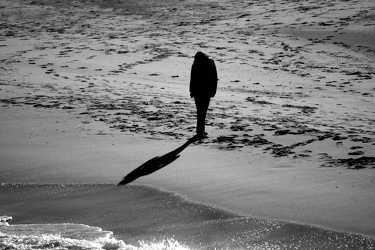 Woman walking the beach [02]