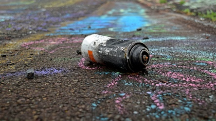 Discarded spray paint can [15]