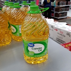 Gallon-sized jug of Great Value canola oil