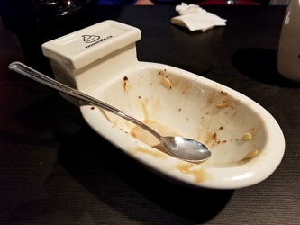 Empty dish at Poop Cafe