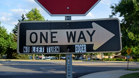 One way sign leaving a shopping center [01]