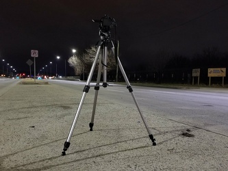 Camera on tripod photographing Benning Road NE [02]