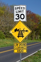 Speed limit and low ground clearance signs [02]