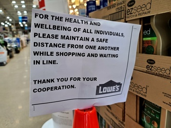 Sign encouraging social distancing at Lowe's