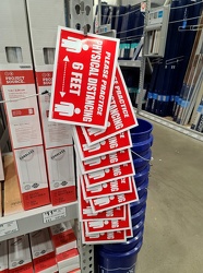 Social distancing signs for sale at Lowe's