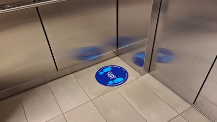 Social distancing signage in an elevator car [03]